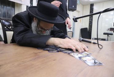  Rav Gamliel Rabinowitz at Chanukah Licht at 'Bayis Lepleitos' on First Night of Chanukah. He Then Led Dreidel and Distributed Gelt.